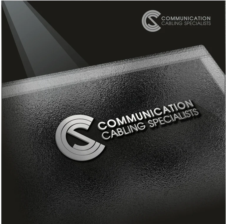 Триизмерна визуализация на метално лого с надпис Communication Cabling Specialists върху текстурирана черна повърхност.
