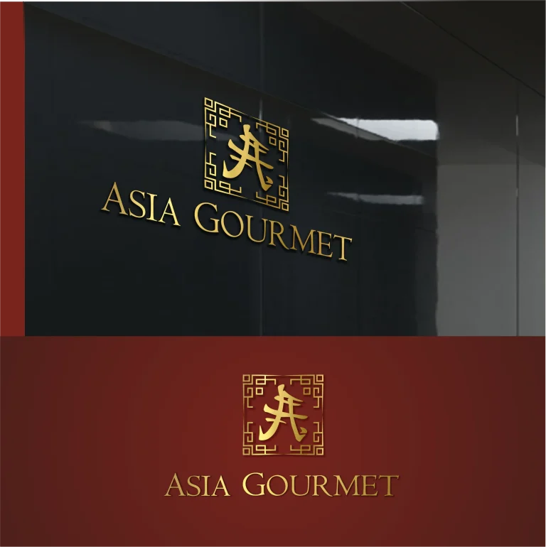 Златисто лого с ориенталски елементи и надпис ASIA GOURMET, представено върху тъмна гланцирана повърхност и плътен червен фон.